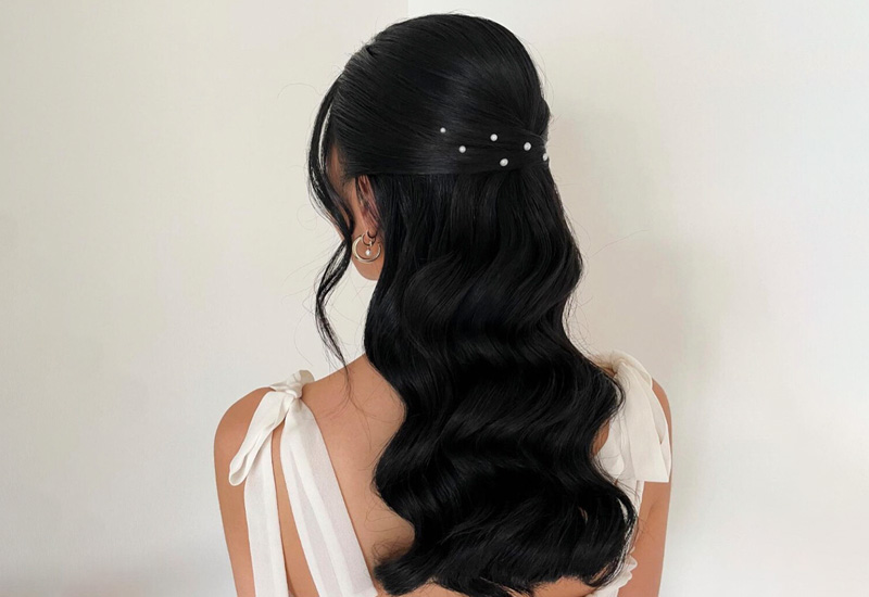 RJ Styles Co Rachel Jones - Alberta Bridal Hairstyling Lessons - Black Haired Bride with sleek Hollywood waves half updo with pearls